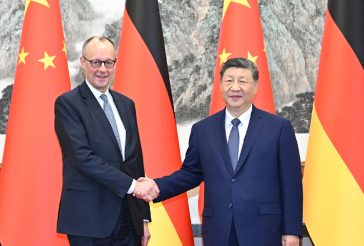  中国元首外交传递信心与力量